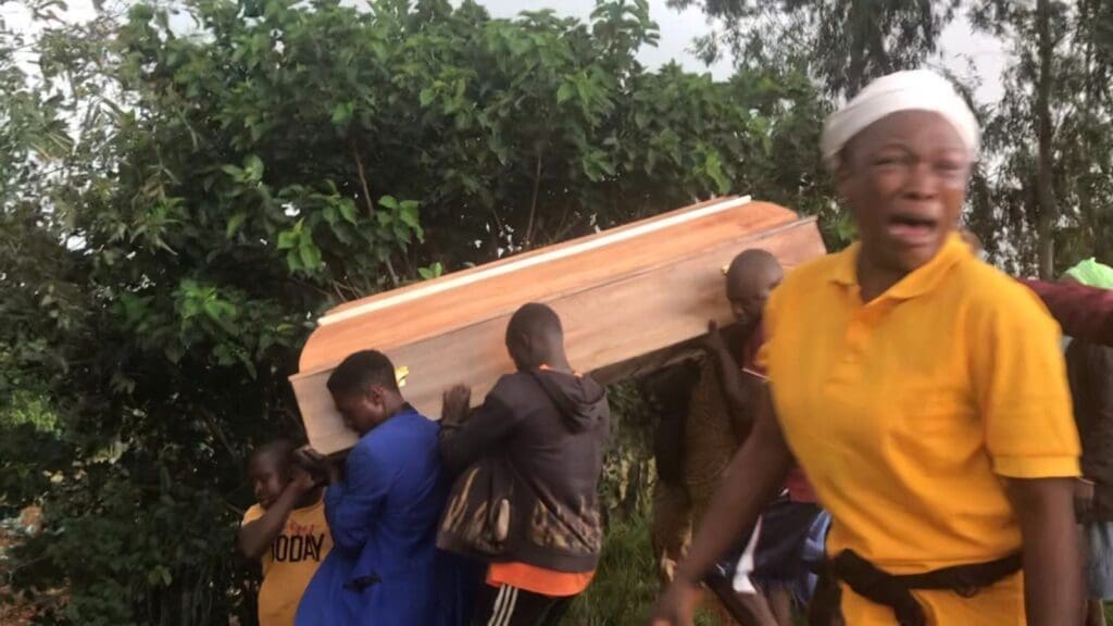 Mother of a civilian guard in Riyom County, Plateau State wails onJune 21 as she says goodbye to her son. Courtesy of Masara Kim