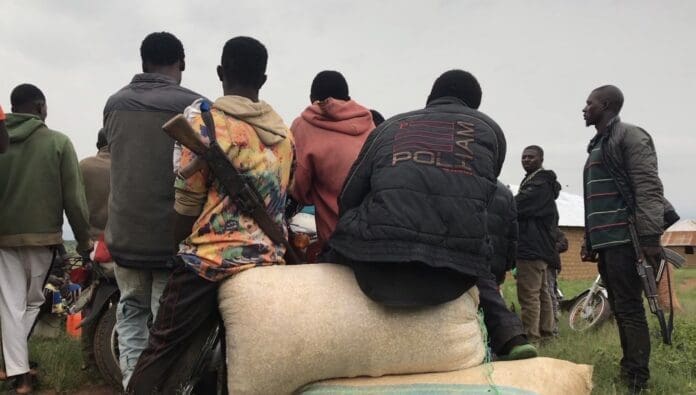 Vigilantes at work defending their towns. Photo by Masara Kim.