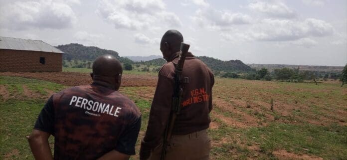 Volunteer guards stand watch on villages under threat in central Plateau State after vicious attacks on May 16, 2023. Photo by Masara Kim, for Truth Nigeria.