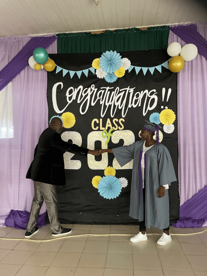 Emmanuel Ogebe, scholarship sponsor of Boko Haram survivor Sarah Emmanuel at her high school graduation in Abuja. Photo by Emmanuel Ogebe.