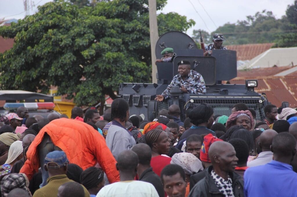 Protestors confront the military during protest in Mangu on August 7, 2023. Photo by Masara Kim.