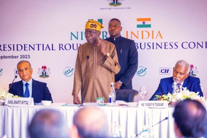 Nigerian President Bola Tinubu speaking at trade conference in New Delhi.