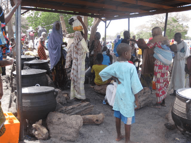 Aid distribution at the CAF school in Abuja. Photo by Mike Odeh James.