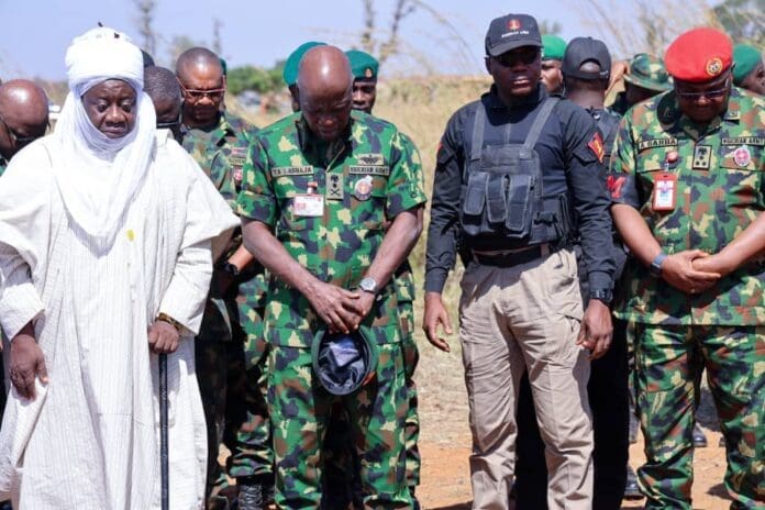 Lt. Gen. Taoreed Lagbaja at the graveside of the victims during his condolence visit to Kaduna community. Credit: Nigerian Army on X.
