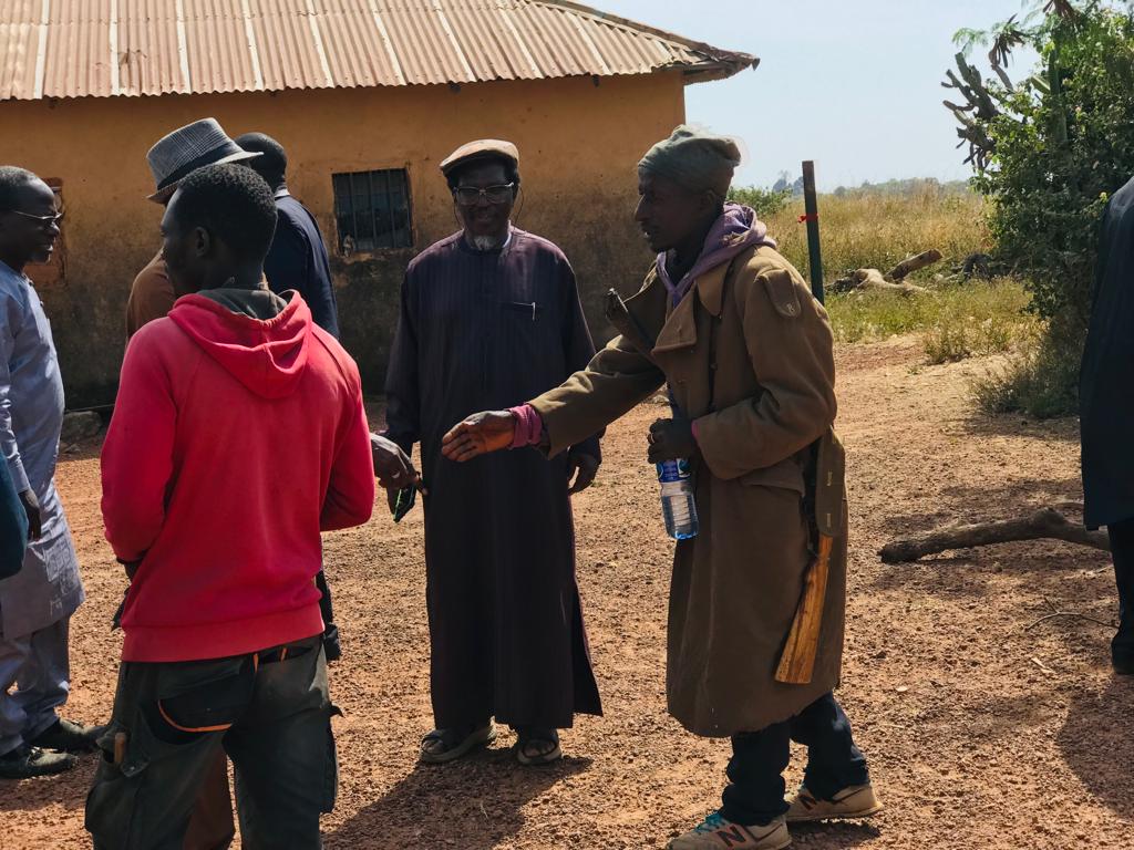 Civilian watchers guarding abandoned houses in Bokkos County, 40 miles south of Jos, after devastating attacks by Fulani terrorists. Credit: Masara Kim.