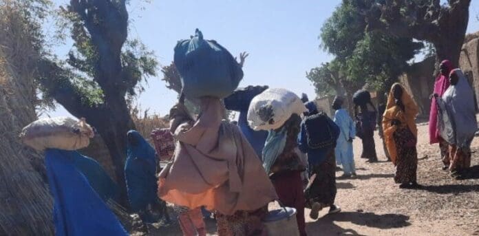 Locals fleeing Nahuta in the aftermath of an attack on a military camp. Photo credit: Premium Times.
