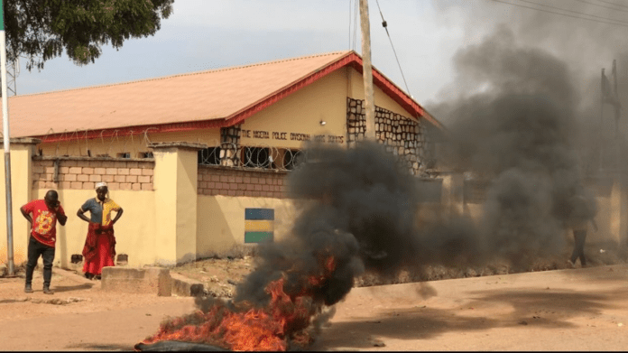 Protestors burned tires in the town of Bokkos to register disgust at the failure if the Nigerian Army to stop or at least slow down the genocidal attacks during five days from Dec. 23, 2023.  Photo by Masara Kim for TruthNigeria.