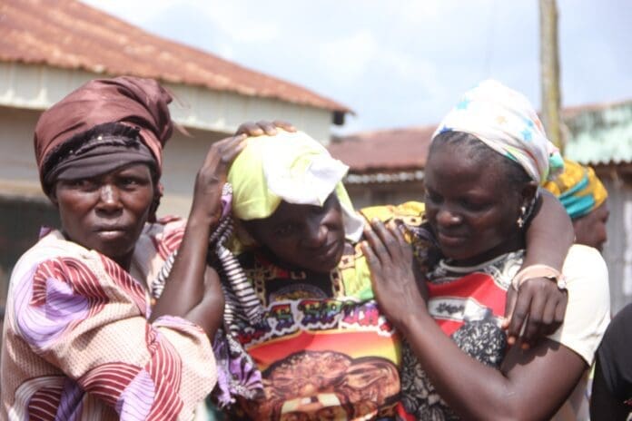 Woman recovering from head wound after citizen protest of military failures in north Mangu County Aug. 6, 2023. The woman said she was attacked by a Nigerian soldier. Photo by Masara Kim for TruthNigeria.