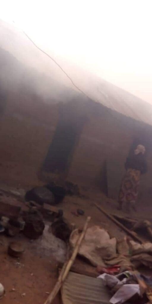 Burnt buildings in Gindin Duste from Sunday morning attacks. St Dominic Catholic Church can be seen with its humble cement row of seats with receding flames in the burnt Church (Credit: Facebook)