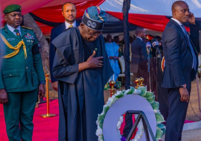 President Tinubu paying his last respect to Nigeria's fallen heroes. Photo credit: X/@PBATMediaCentre