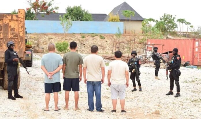 Four arrested Chinese men. Photo credit: Arise News.
