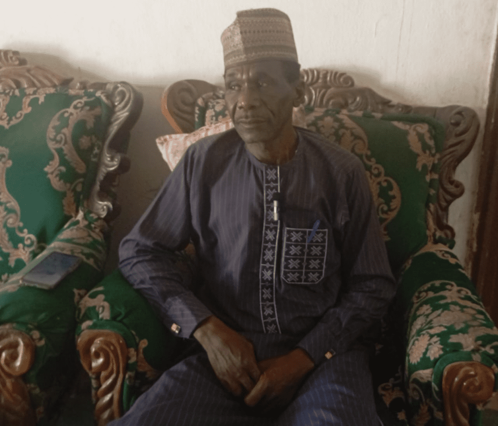 “Bring Back Our Land!” Mr. Yakubu Nkeki, the President of the Association of Parents of Kidnapped Chibok Girls. credit: Mike Odeh James.  