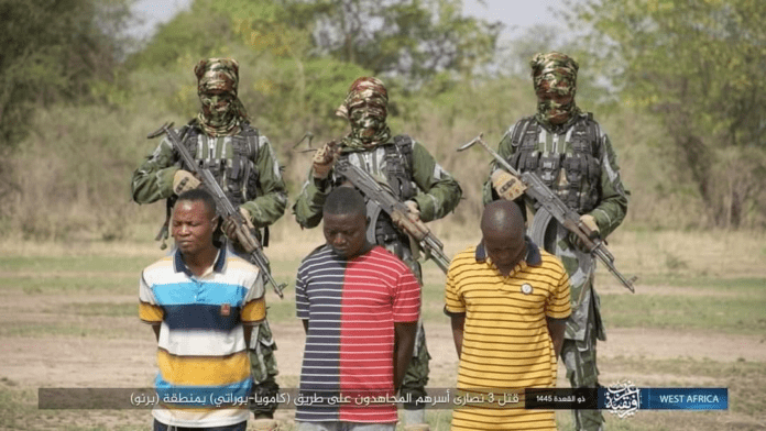 Screen shot from Islamic State in West Africa Propaganda Channel depicting martyrdom of Three Nigerian Christians on June 3, 2023. Credit AMAQ.