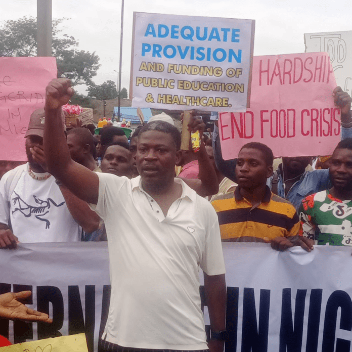 Demonstrators carrying placards, gathered at the Moshood Abiola National Stadium, Abuja for day 3 of the #EndBadGovernance protest. Photo credit: (credit: Olatunde Marolan)