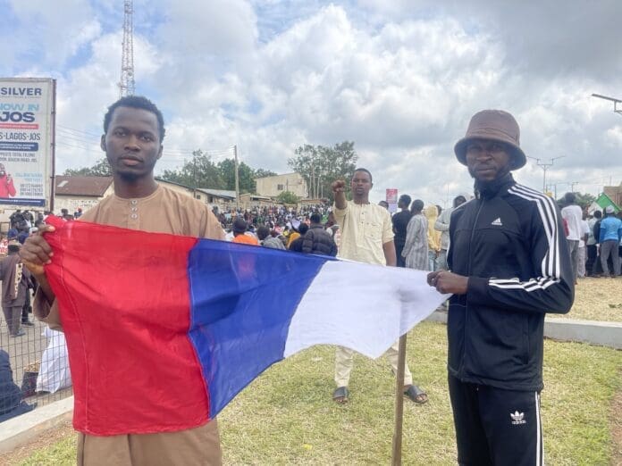 Protesters with the Russian flag in Jos, Plateau State on Sunday, August 4th. Photo credit: Steven Kefas for TruthNigeria.