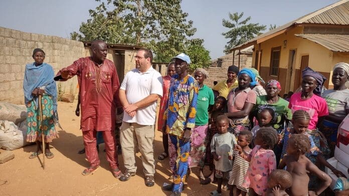 Judd Saul brings aid to victims of Islamic terrorist attack. Photo by Masara Kim.