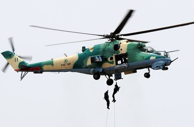 Nigerian soldiers practicing cable descent from a hovering helicopter. courtesy: Nigerian Air Force.