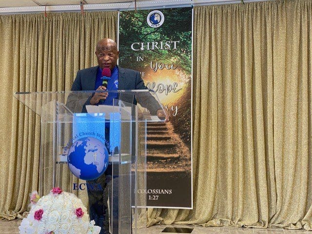 Rev. Henry Bellow, above, chief pastor at Ecumenical Church Winning All (ECWA) preaches on July 11, 2021 at its District Heights location near Washington, D.C. Until recently, Rev. A.D. Adamu, the nephew of Emmanuel Nyasom Jr., was an associate pastor of this church. ECWA members pray fervently for God’s intervention in the kidnapping crisis. Credit: Douglas Burton