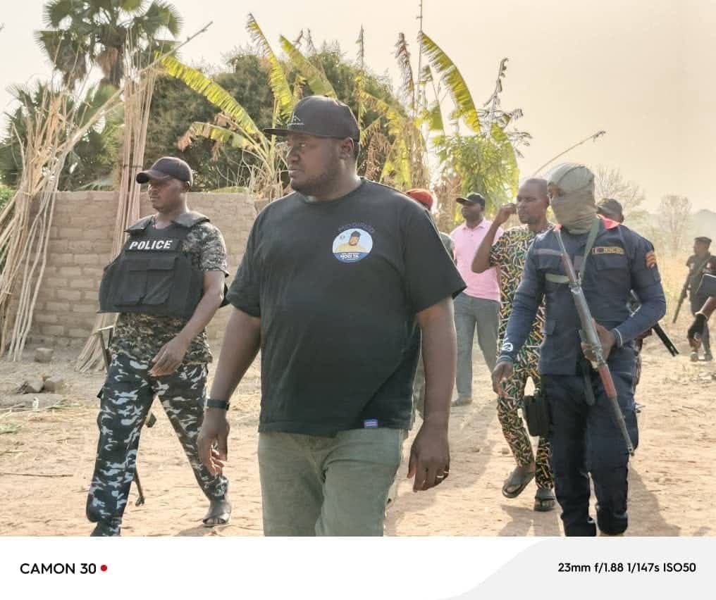 A visibly angry Jonathan Modi, Ukum County Chairman, surveys damage in a village after an attack by Fulani Ethnic Militia. Credit: Ekani Olikita. 