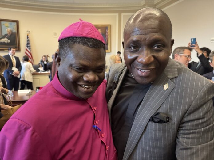 Bishop Wilfred Anagbe, left, and Rev. Akila Yusuf of Jos embrace at end of conference, visibly pleased with the result. Credit: Dede Laugesen