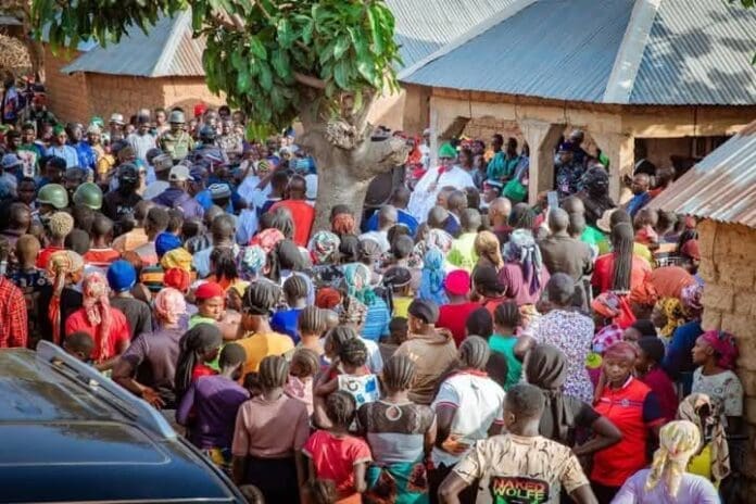 Gov. Caleb Mutfwang comforts survivors of March 27th terror attack in Fofwere village on March 29 (credit Plateau State Government)