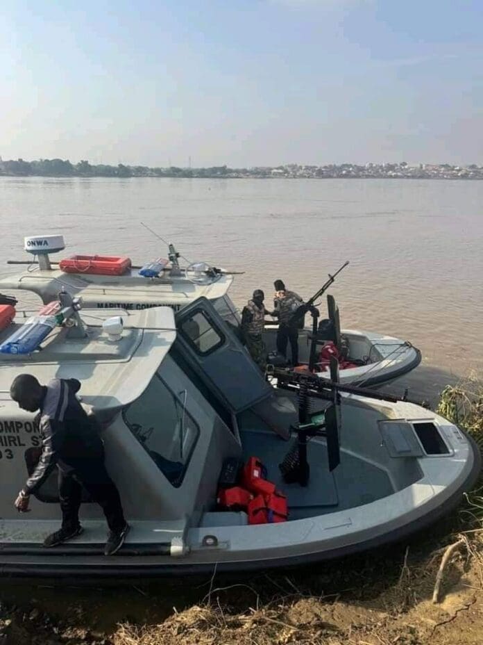 Nigerian Navy personnel position themselves at shore on patrol on Lake Chad in November 2024.Courtesy of Nigerian Government.