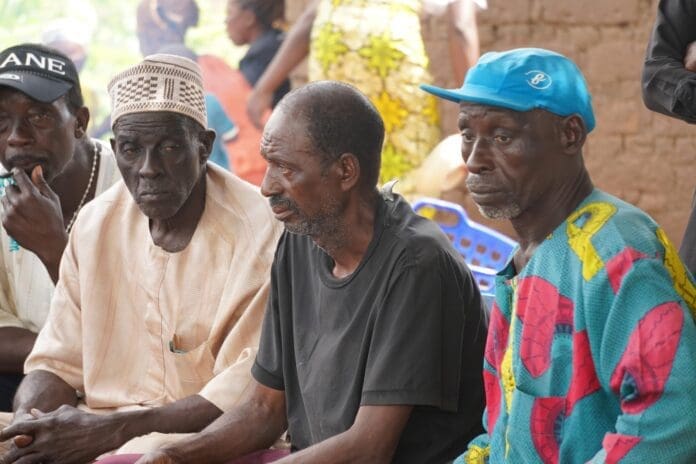 Yelwata elders mourning when the casket of Wilfred who was killed in the attack arrived the community for funeral on June 21. Credit: TP-MPF