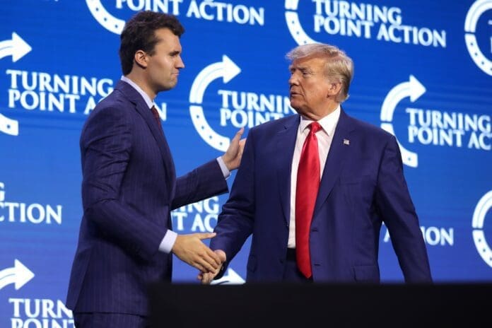 Charlie Kirk and former President of the United States Donald Trump speaking with attendees at the 2023 Turning Point Action Conference at the Palm Beach County Convention Center in West Palm Beach, Florida. Photo by Gage Skidmore from Surprise, AZ, United States of America.