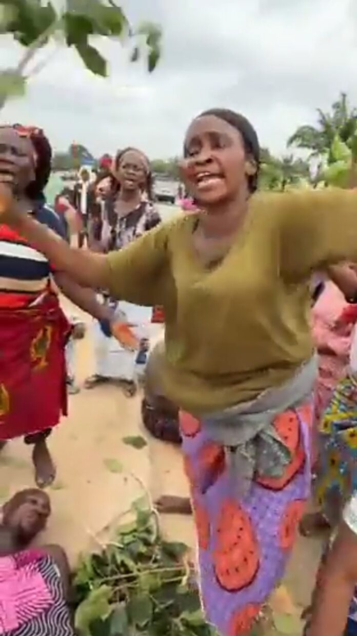Mrs Asebe, one of the protesters who lost her only brother Credit: Ekani Olikita.