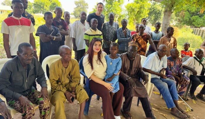 Anja Grubacic - 3rd from left - in group photo with some of the survivors of the Yelewata massacre. Photo by Ebere Inyama.