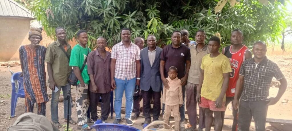 Villagers with the Tribal chief and Truthnigeria's Mike Odeh James, who is in the front row wearing a dark shirt. Credit Mike Odeh James.