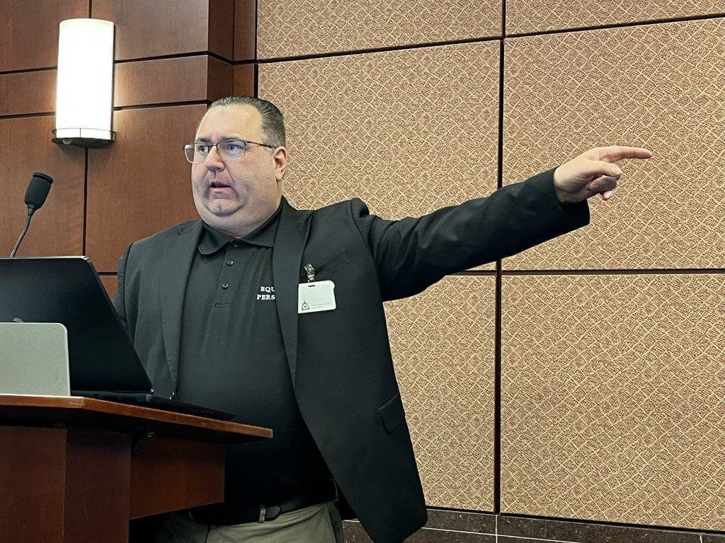 Equipping The Persecuted Founder Judd Saul pointing to the Nigerian Security Tracker on screen. Photo by Douglas Burton.