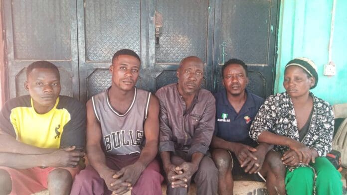 Precilia Yakubu, Gideon Yakubu sitting close to their father after the interview with TruthNigeria. Credit Mike Odeh James