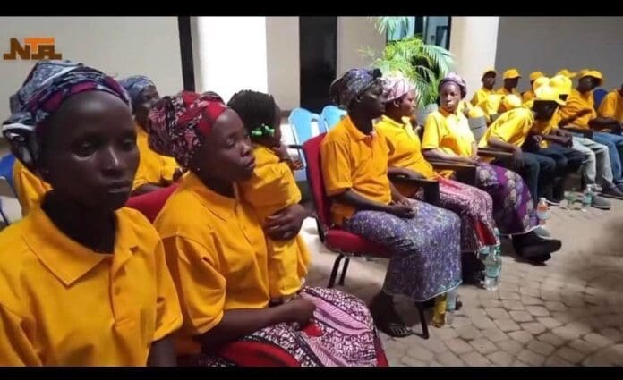 Haggard survivors of the Kurmin Wali abduction attend rescue celebrating in Abuja on Feb. 6. Credit: Government of Nigeria. 