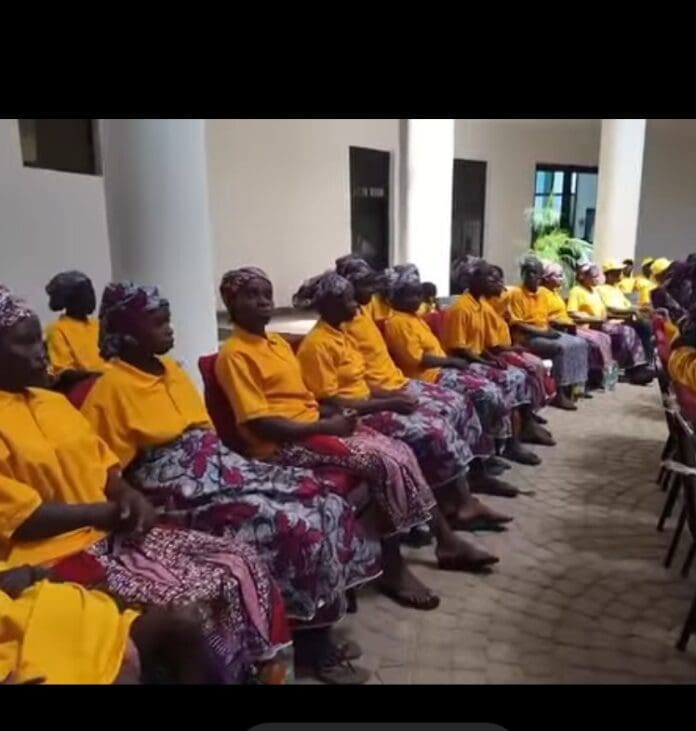 Cross section of the freed 82 Kurmin Walli hostages, seated in a hall at Government House, Kaduna, Thursday as they await the arrival of Gov Uba Sani to to welcome them back (Credit: Uba Sani Facebook).