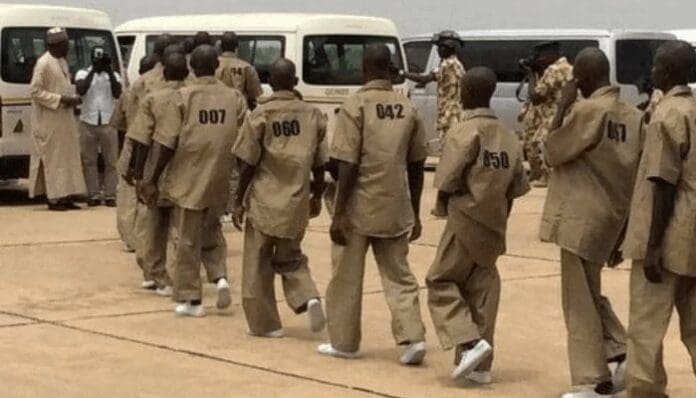 Image of rehabilitated terrorists in matching uniforms| Credit: TheCable