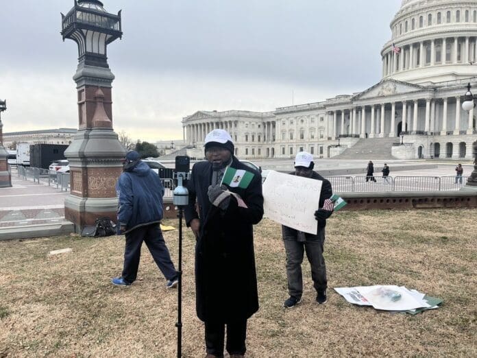 Stephen Osemegwie, and members of Save Nigeria Group US denounced the National Security Advisor's language on a chilly March 2nd at the U.S. Capitol in Washington, D.C. Photo credit Douglas Burton.