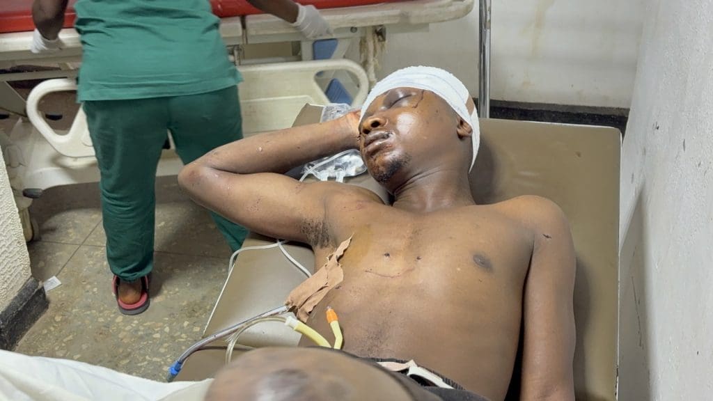 Longji Molshap battles for his life at the hospital after being attacked by a Muslim mob. Photo by Masara Kim